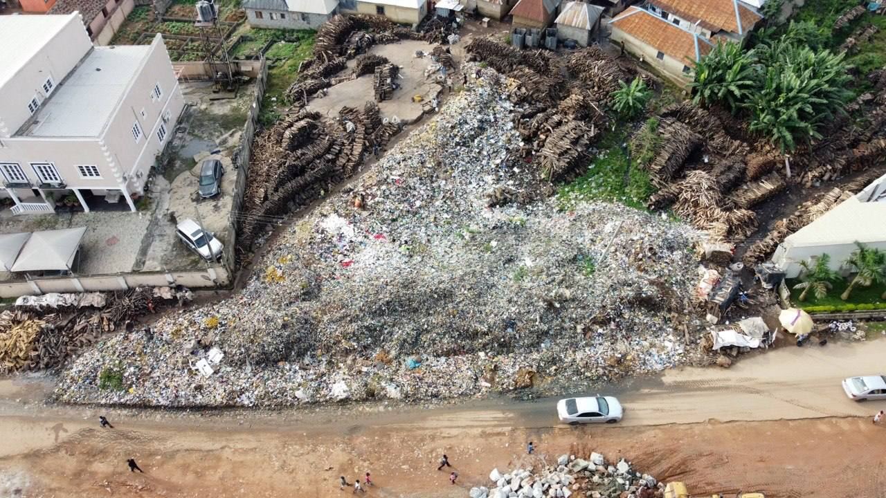 From above: the waste pile filling the plot between houses and the road